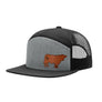 A gray and black trucker-style cap with a brown cow leather patch on the front panel, shown against a plain white background.
