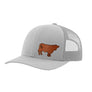 A light gray trucker-style cap with a brown cow leather patch on the front panel, shown against a plain white background.