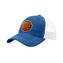 A royal blue trucker-style cap with a white mesh back and a brown 'your design here' leather patch on the front panel, shown on a plain white background.