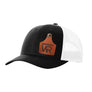 A black trucker style hat with a white mesh back, and a leather cattle tag shaped patch engraved with "wr" on a white background