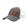 A grey trucker-style cap with a white mesh back and a brown cow leather patch on the front panel, shown on a plain white background.
