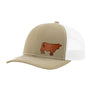 A trucker-style baseball cap with a tan/khaki front panel and visor, white mesh back panels, and a brown cow logo patch on the front, shown on a plain white background.