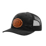 A black camouflage trucker hat with a black mesh back and a custom brown patch on the front that reads 'YOUR DESIGN HERE'.