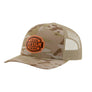 A desert camouflage trucker hat with a curved brim and mesh back, featuring a customizable brown patch on the front that reads 'YOUR DESIGN HERE'.