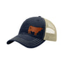 A navy blue trucker cap with a tan mesh back, and a brown cow leather patch on the front, shown on a plain white background.