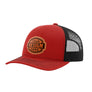 A red trucker-style cap with a black mesh back and a brown 'your design here' leather patch on the front panel, shown on a plain white background.