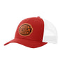 A red trucker-style cap with a white mesh back and a brown 'your design here' leather patch on the front panel, shown on a plain white background.