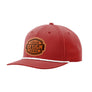 A red baseball cap with a curved brim, featuring a white rope detail along the edge of the brim and a customizable brown patch on the front that reads 'YOUR DESIGN HERE'.